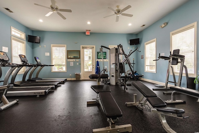 workout area featuring ceiling fan and a healthy amount of sunlight