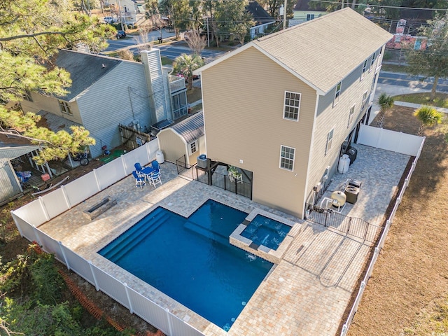 view of swimming pool featuring a patio