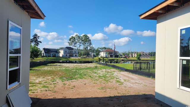 view of yard with a water view