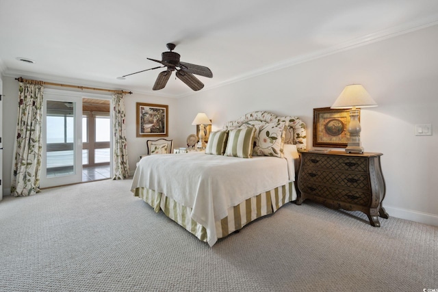 bedroom with access to exterior, carpet flooring, and crown molding