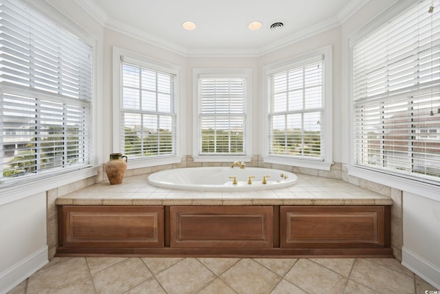 full bath with ornamental molding, tile patterned flooring, a garden tub, and a healthy amount of sunlight