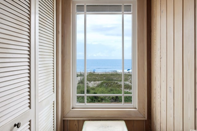 details with a water view and a view of the beach