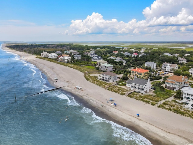 birds eye view of property with a water view, a residential view, and a view of the beach