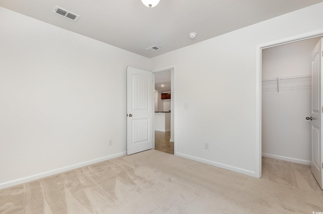 357 Cardita Loop, Myrtle Beach, SC 29588 - unfurnished bedroom featuring carpet floors, baseboards, a spacious closet, and a closet
