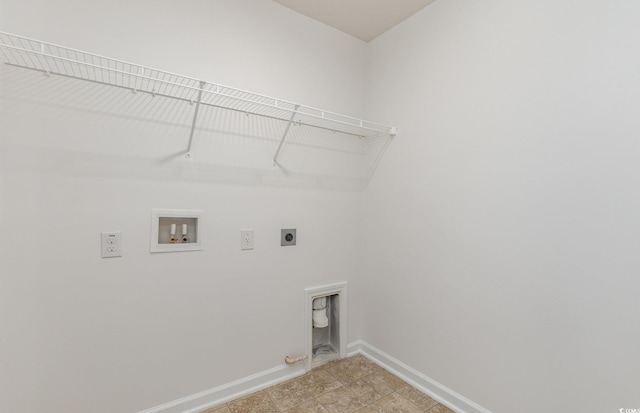 clothes washing area featuring hookup for an electric dryer, hookup for a washing machine, and hookup for a gas dryer