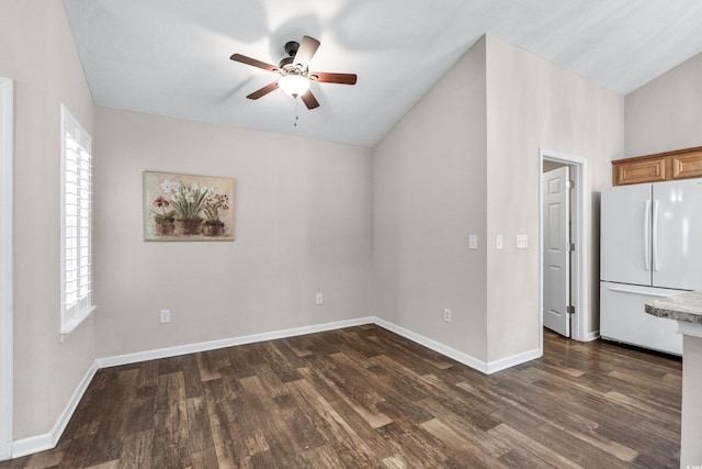 interior space with dark hardwood / wood-style floors and ceiling fan