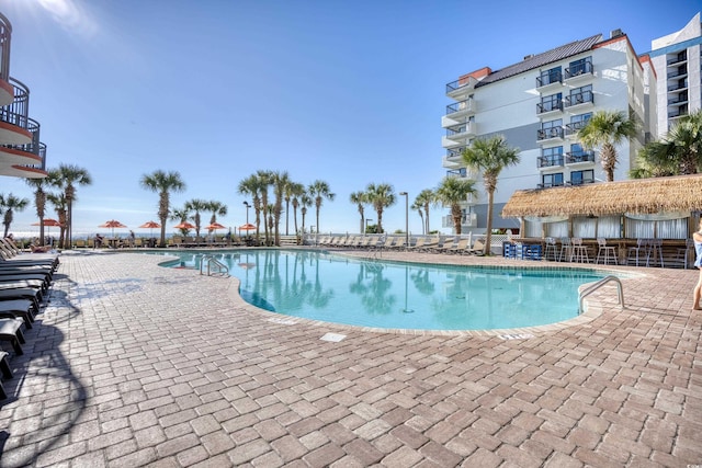 view of pool featuring a patio area