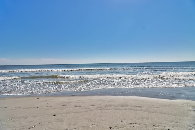 property view of water featuring a view of the beach