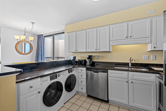 kitchen featuring washer and clothes dryer, dishwasher, light tile patterned floors, and white cabinetry