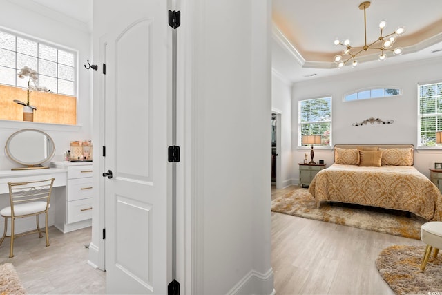 bedroom featuring crown molding, multiple windows, and a chandelier