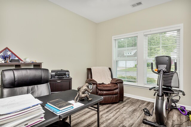 home office with light wood-type flooring