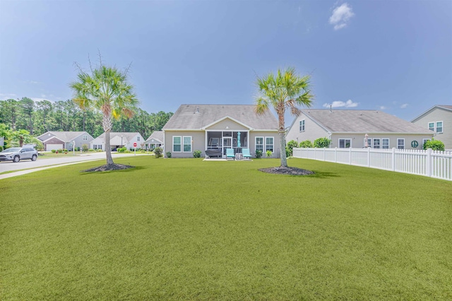 view of front facade with a front yard