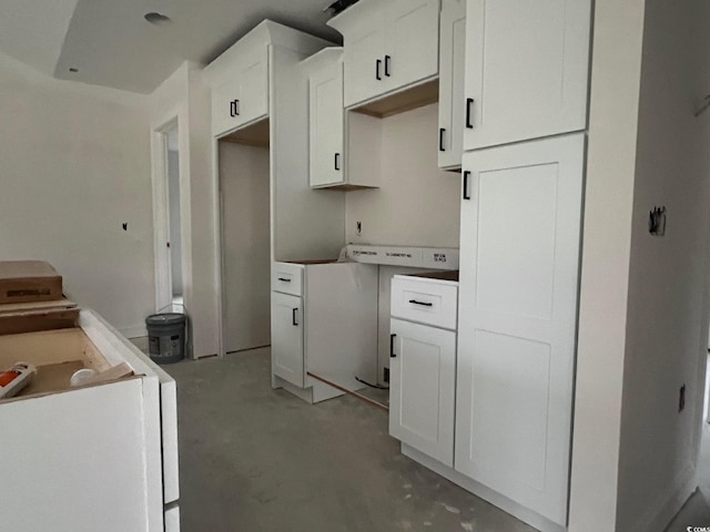 kitchen featuring white cabinets