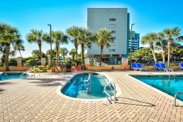 view of pool with a patio area