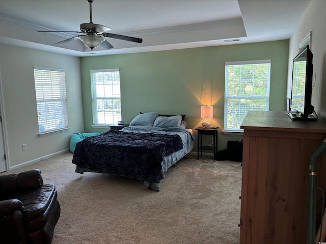 bedroom featuring ceiling fan and light carpet