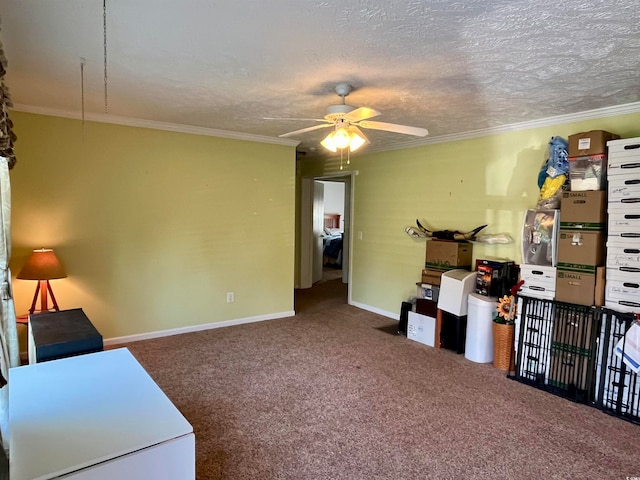 interior space featuring ornamental molding, carpet flooring, a textured ceiling, and ceiling fan