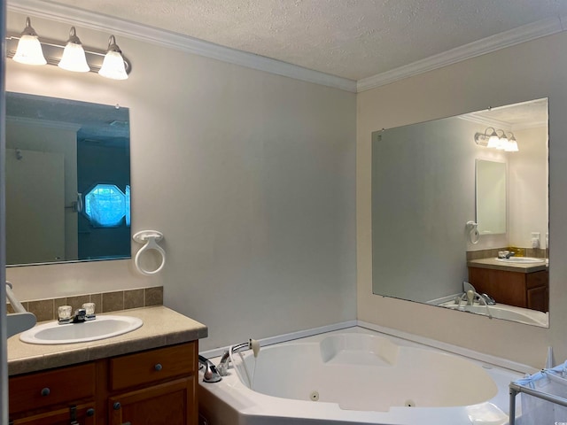 bathroom featuring a textured ceiling, double sink vanity, a bathing tub, and crown molding