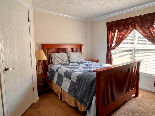 carpeted bedroom with multiple windows and a textured ceiling