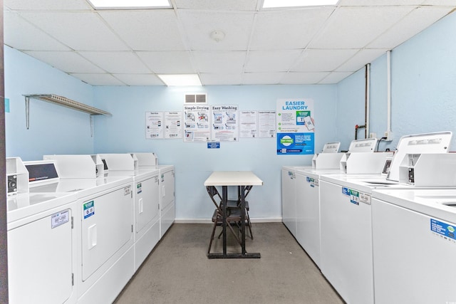 clothes washing area featuring independent washer and dryer