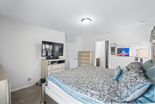 bedroom featuring baseboards and carpet flooring