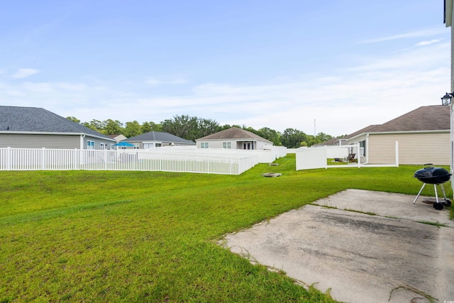 view of yard featuring a fenced backyard and a patio area