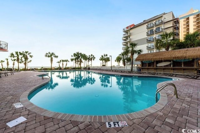 pool with a patio