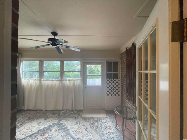 unfurnished room featuring ceiling fan