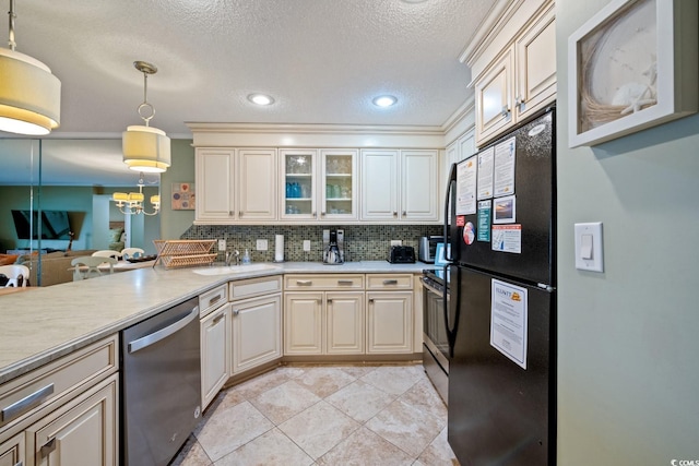 kitchen with decorative backsplash, appliances with stainless steel finishes, sink, hanging light fixtures, and light tile patterned flooring