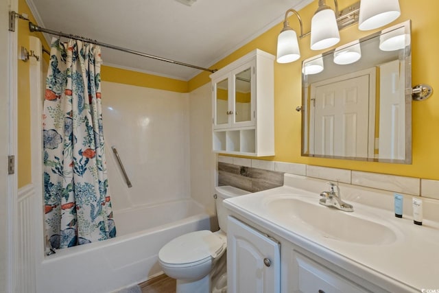 full bathroom featuring shower / tub combo, vanity, toilet, and ornamental molding