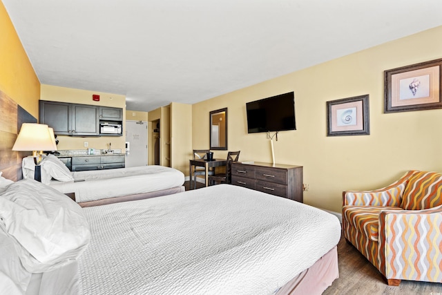 bedroom featuring hardwood / wood-style flooring