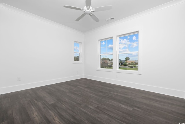 unfurnished room with ornamental molding, dark wood-style flooring, baseboards, and ceiling fan