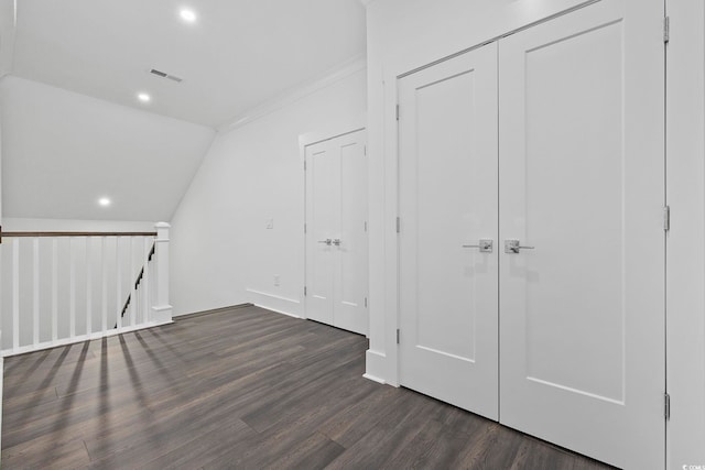 bonus room featuring dark wood-style floors, lofted ceiling, recessed lighting, and baseboards