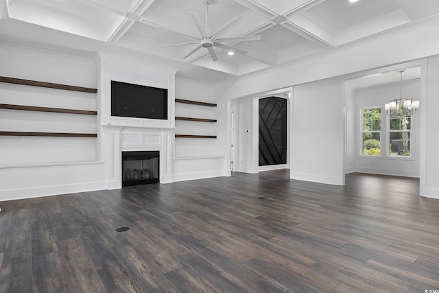 unfurnished living room with beam ceiling, dark hardwood / wood-style flooring, a large fireplace, and coffered ceiling