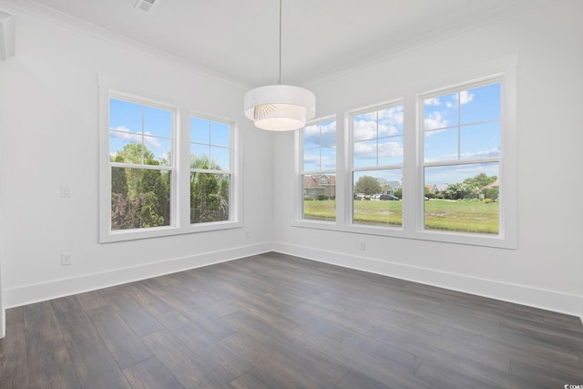 unfurnished dining area with dark hardwood / wood-style flooring and crown molding