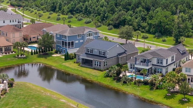 drone / aerial view featuring a water view