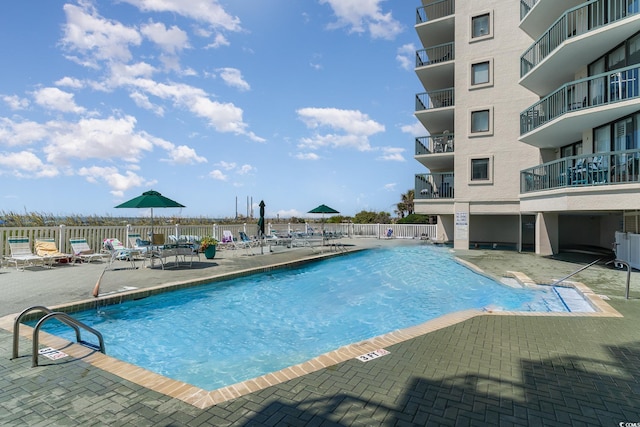 view of pool with a patio area