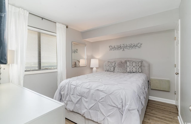 bedroom featuring light wood-type flooring