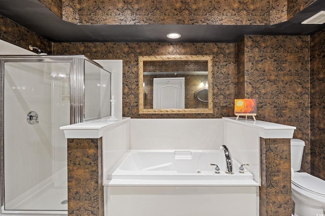 bathroom featuring shower with separate bathtub and toilet