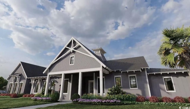 view of front of home featuring a front lawn