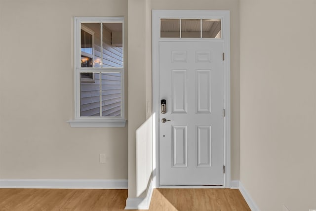 foyer entrance featuring light wood-type flooring