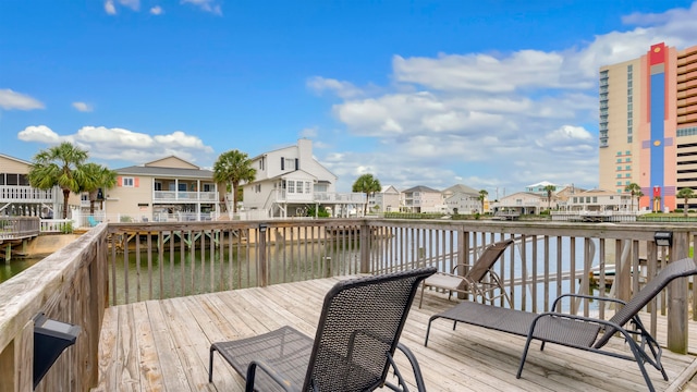 wooden terrace with a water view