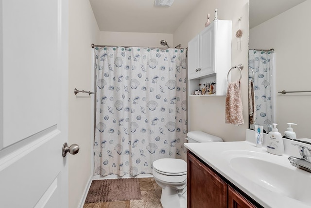 bathroom with vanity, a shower with curtain, and toilet