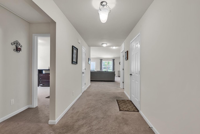 corridor with light carpet