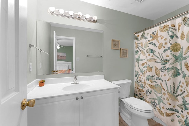 4314 S Ocean Blvd Unit B-1, North Myrtle Beach, SC 29582 - bathroom with vanity, toilet, ensuite bathroom, and a shower with curtain
