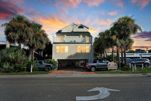 view of outdoor building at dusk