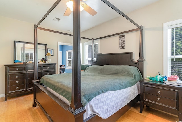 bedroom featuring light hardwood / wood-style floors and ceiling fan