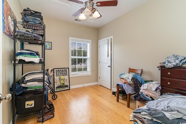 interior space featuring ceiling fan