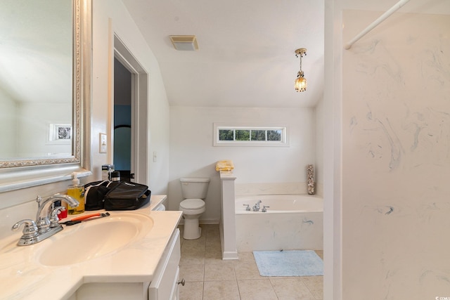 bathroom with lofted ceiling, tile patterned flooring, a bathtub, vanity, and toilet