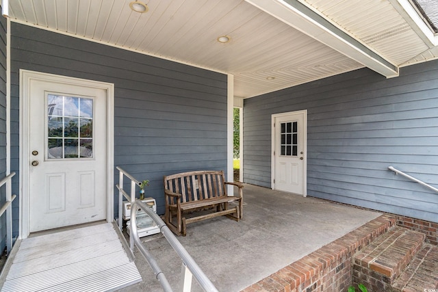 entrance to property with a patio