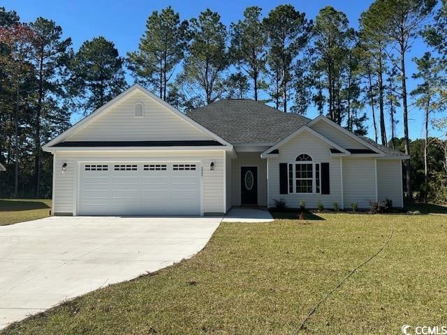 single story home with a front lawn and a garage